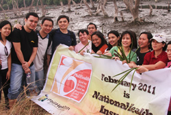 PhilHealth Employees Plant Mangroves in Navotas City