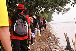 PhilHealth Employees Plant Mangroves in Navotas City